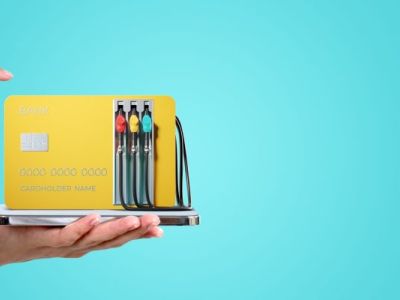 Woman,Hand,Holding,A,Smartphone,,Finger,Touch,Yellow,Credit,Card