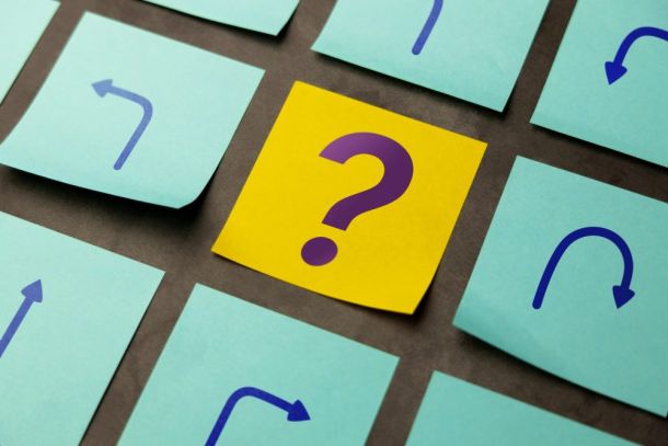 Economic,Uncertainty,Symbolized,By,Arrows,And,A,Question,Mark,,Reflecting