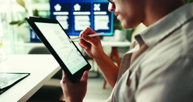 Annual,Report,,Screen,Or,Hands,Of,Businessman,On,Tablet,For